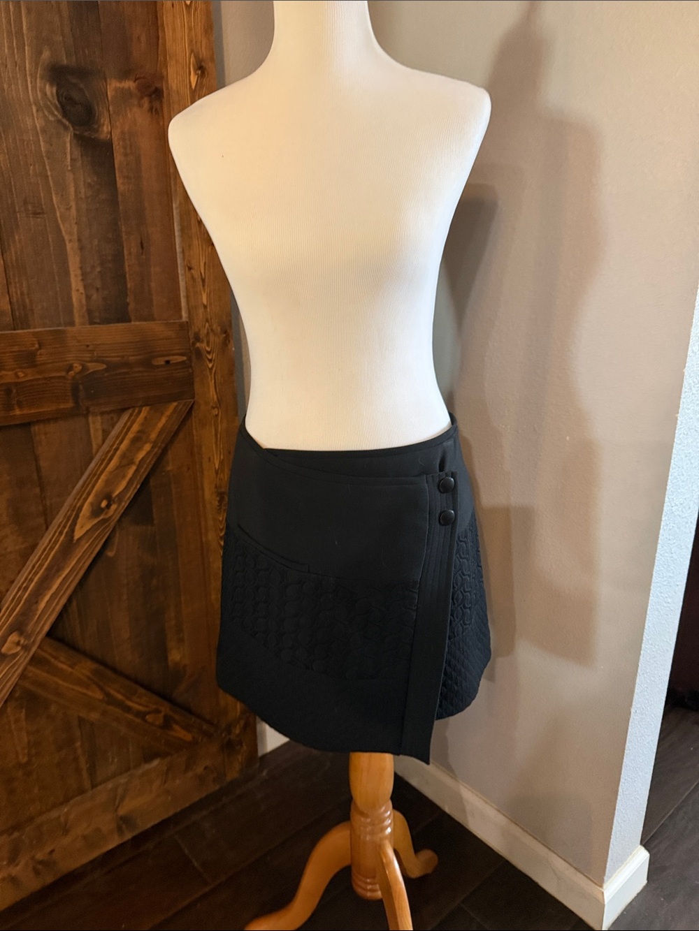 CAbi Black Mini Wrap Skirt with Knit Panels. Classic GO - TO skirt for fall!